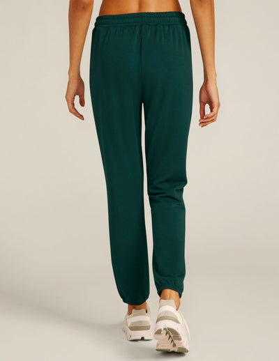 green midi joggers with a drawstring at waistband. 