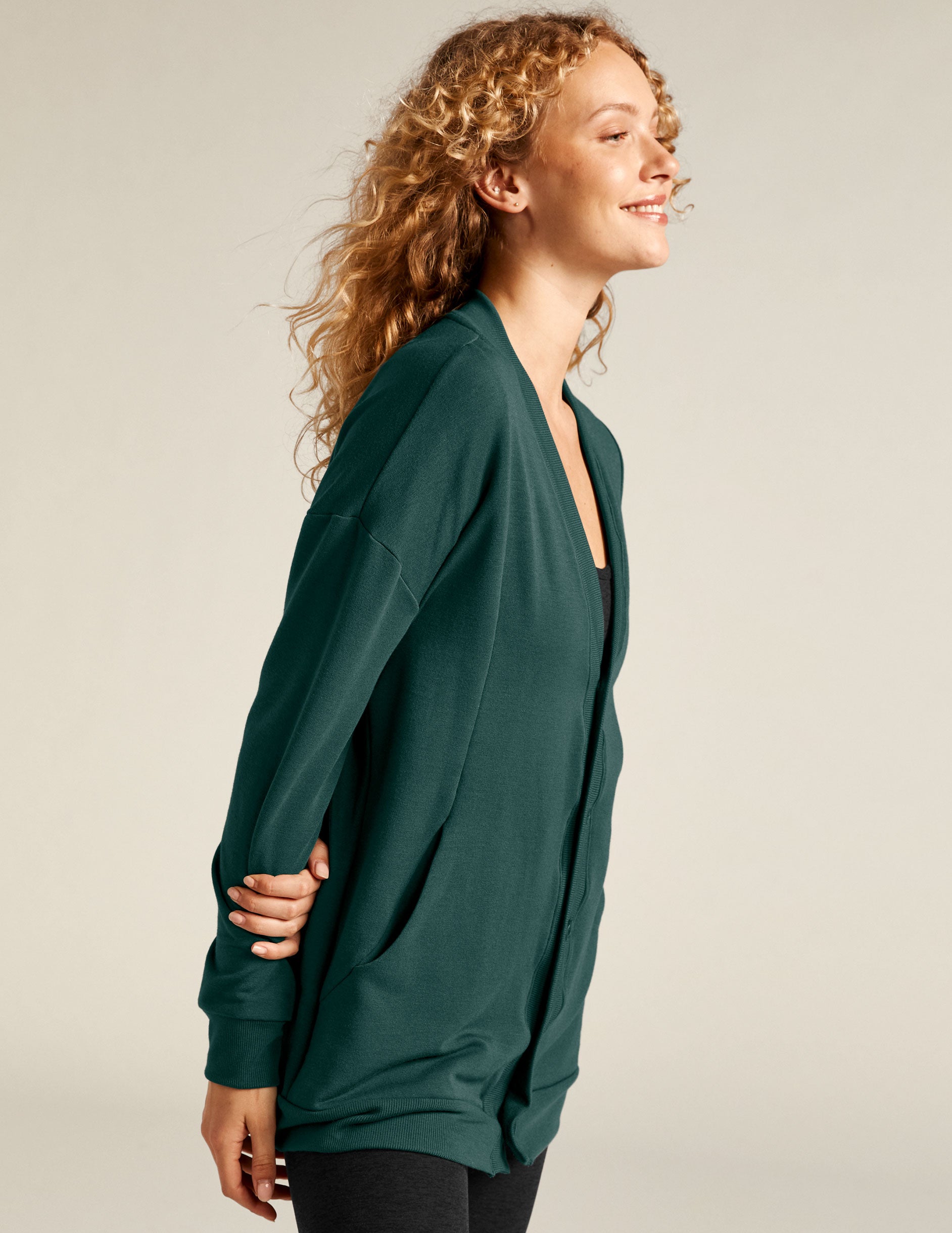 green button-up cardigan. 