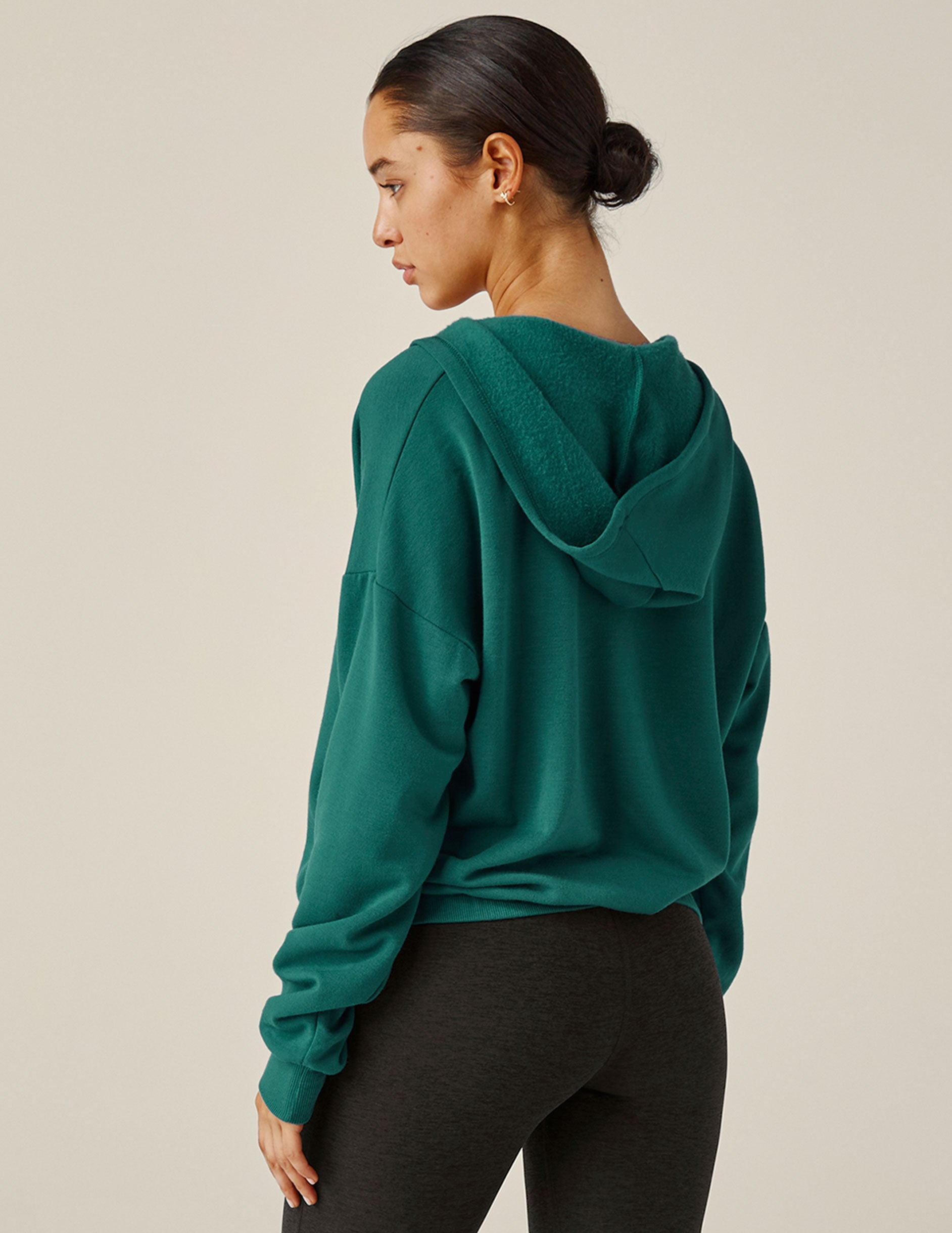 green hooded pullover with front crossover