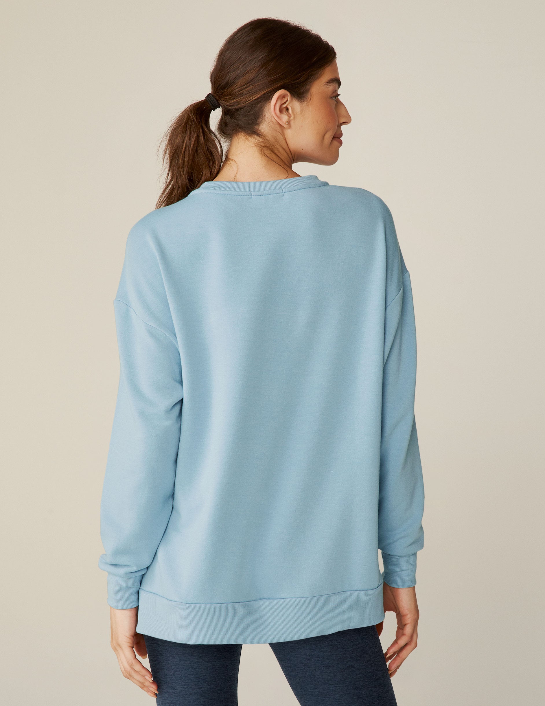 blue relaxed fit crew neck sweater. 
