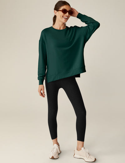 green long sleeve sweaters with side slits. 