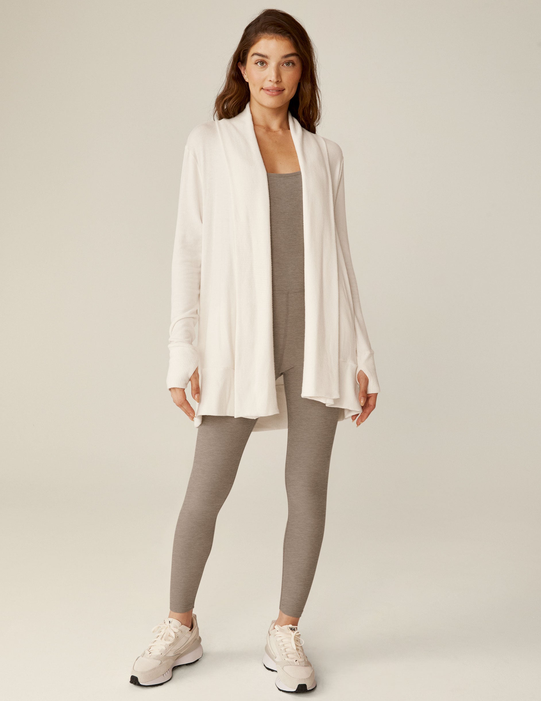 white cardigan with thumb holes