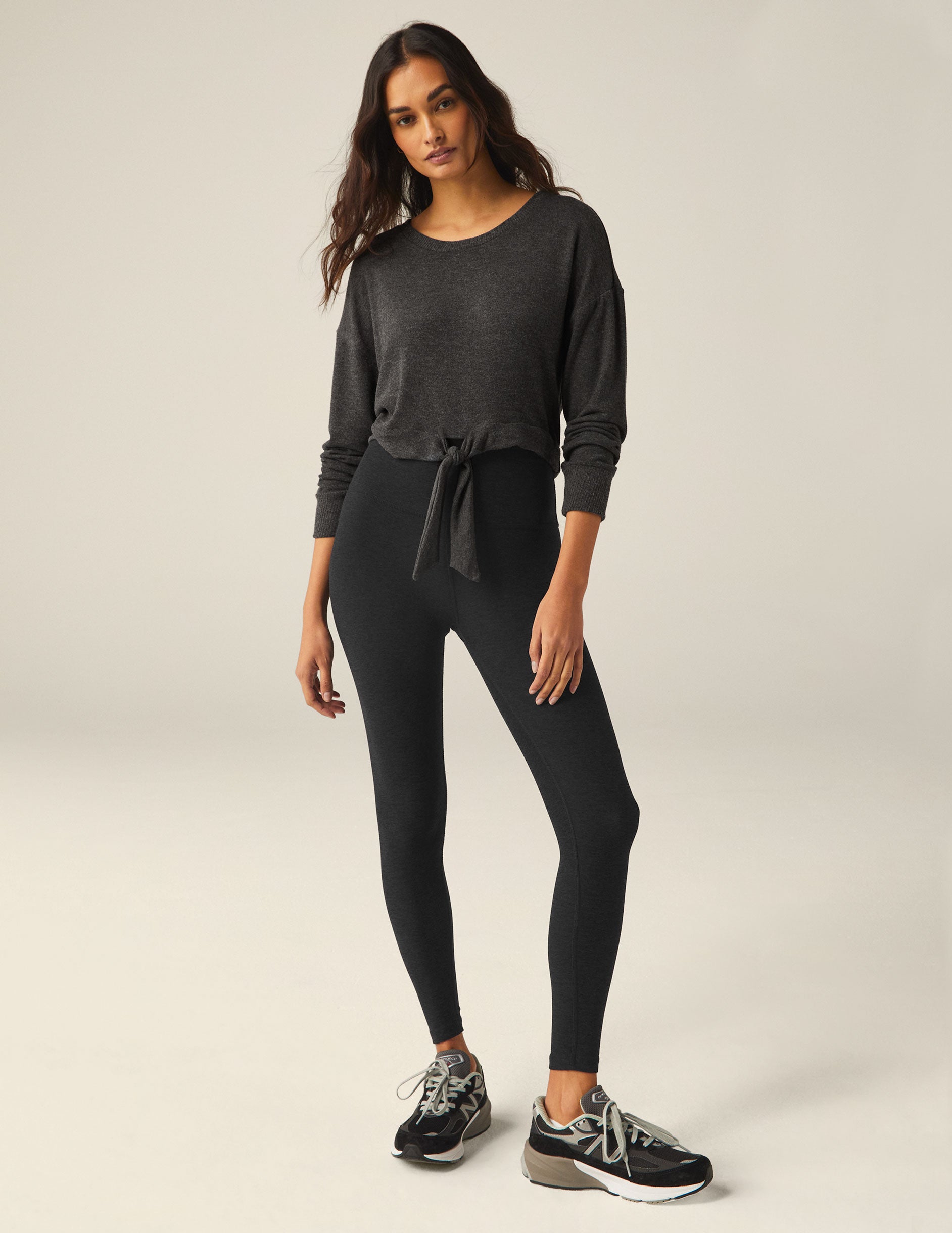 gray scoop neck cropped pullover with a front tie detail. 