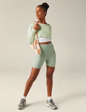 green off the shoulder shrug top with keyhole back.