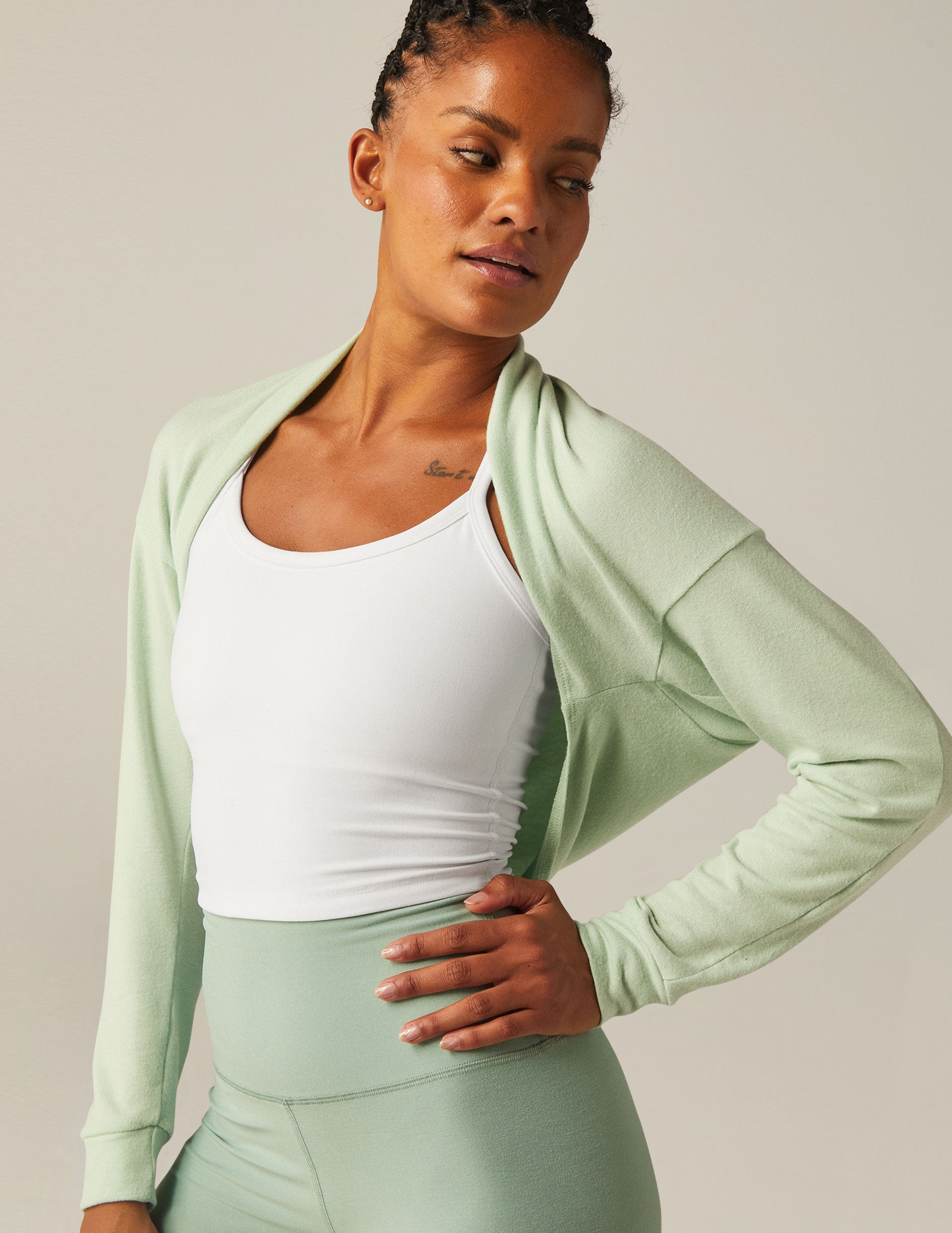 green off the shoulder shrug top with keyhole back.