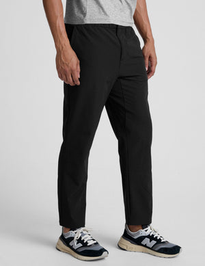 Black Dynamic Men's Straight Leg Pant featuring a relaxed fit, elastic waist, and ankle-length hem shown on a model.