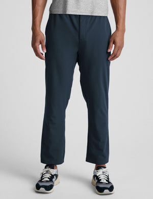 Front view of navy Dynamic Men's Straight Leg Pant featuring a relaxed fit and straight leg silhouette on a model.