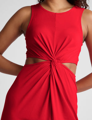 red midi length dress with a cutout detailing at waist. 