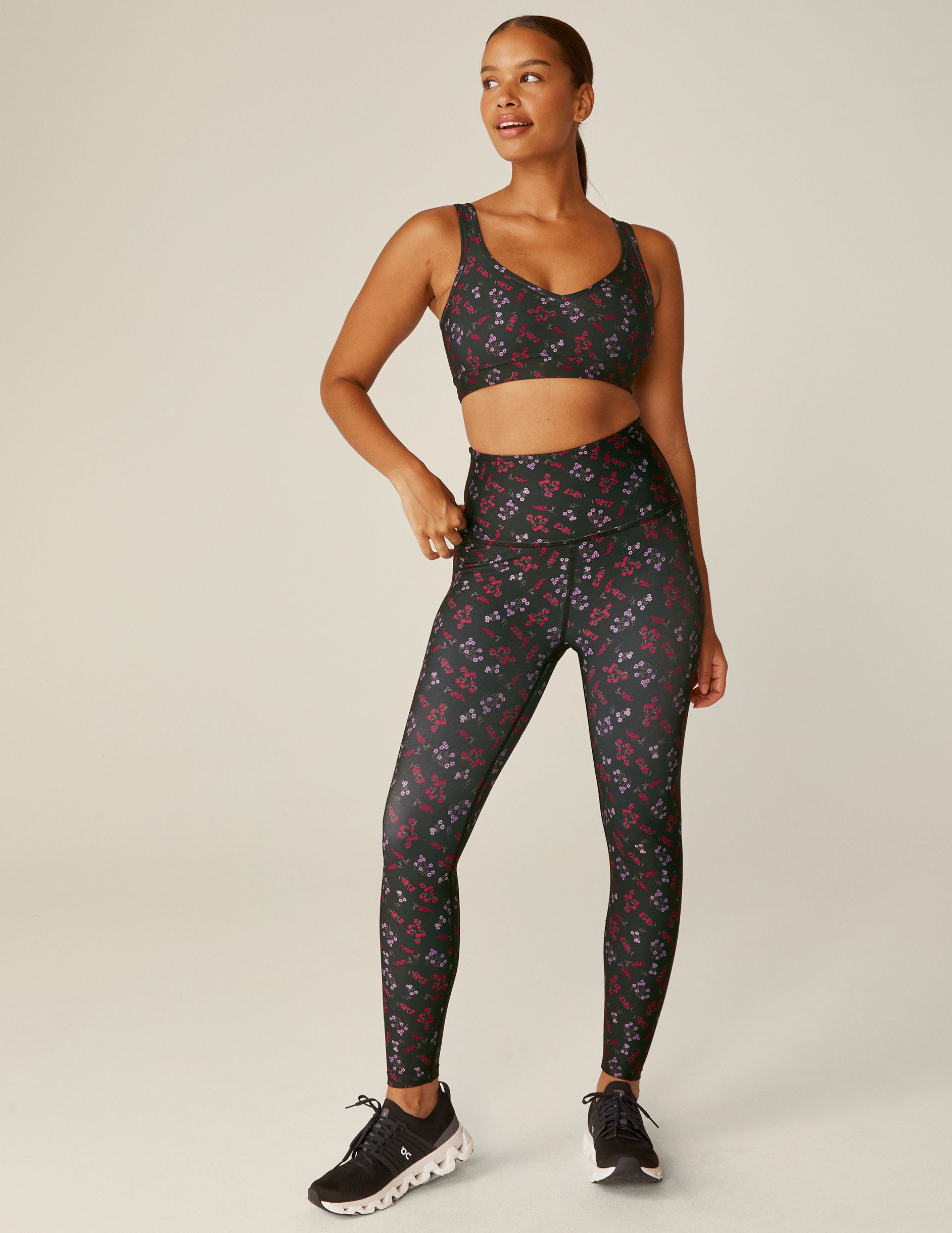 black floral printed (red and purple flowers) high-waisted midi leggings. 