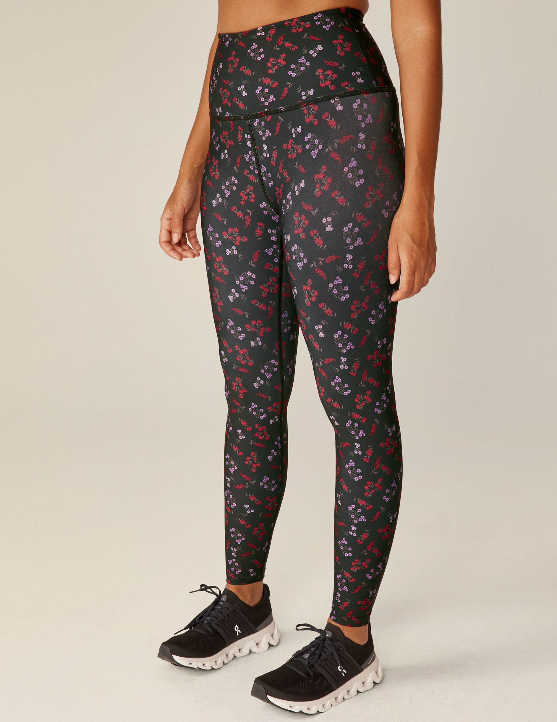 black floral printed (red and purple flowers) high-waisted midi leggings. 