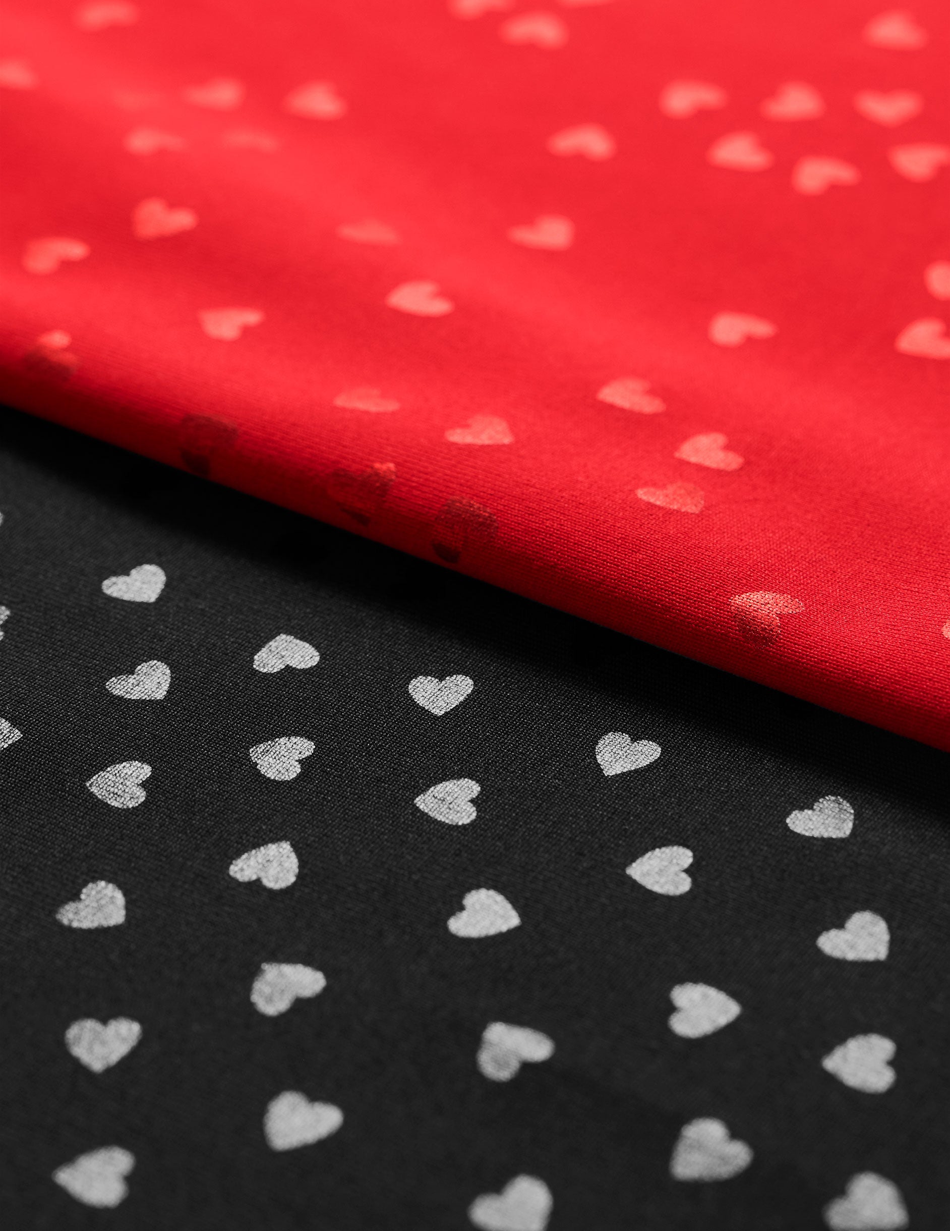 Red and black hearts powershine fabric. 