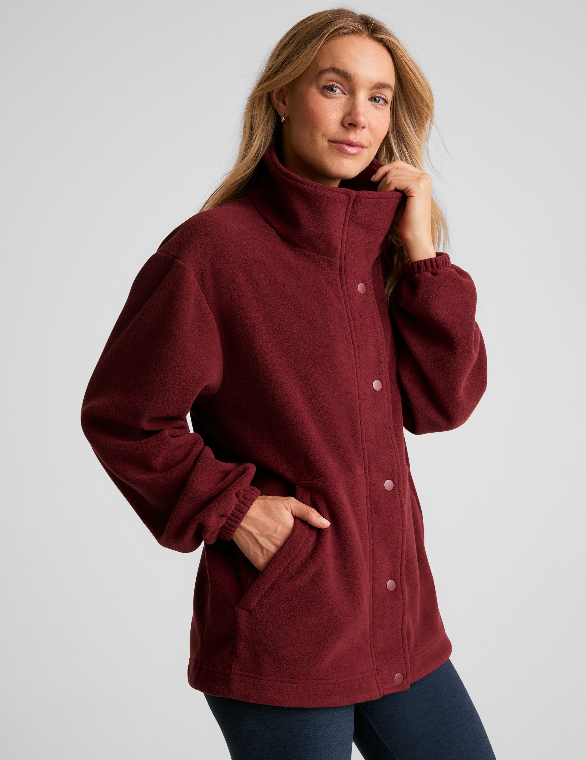 red fleece button down jacket.