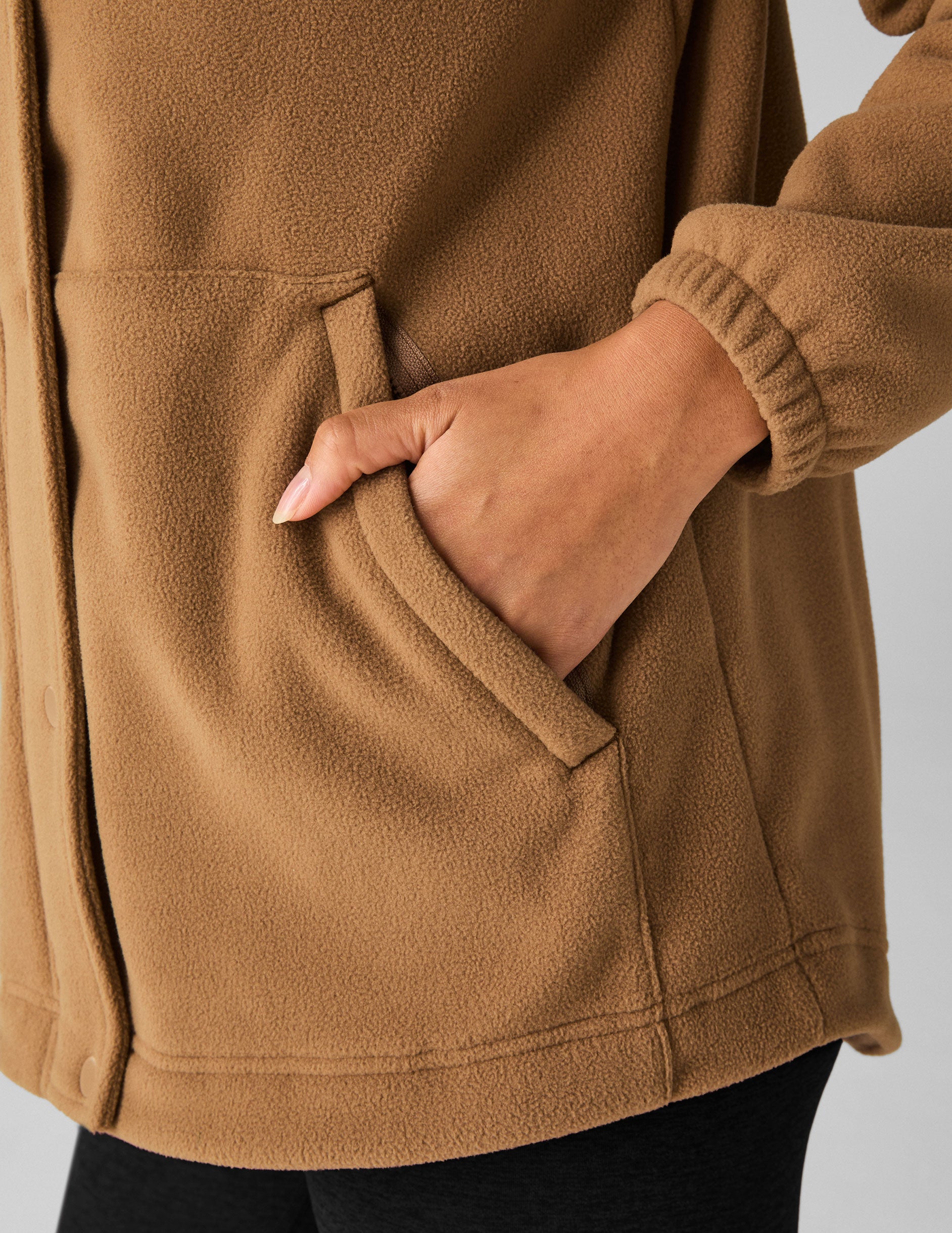 brown fleece button down jacket.