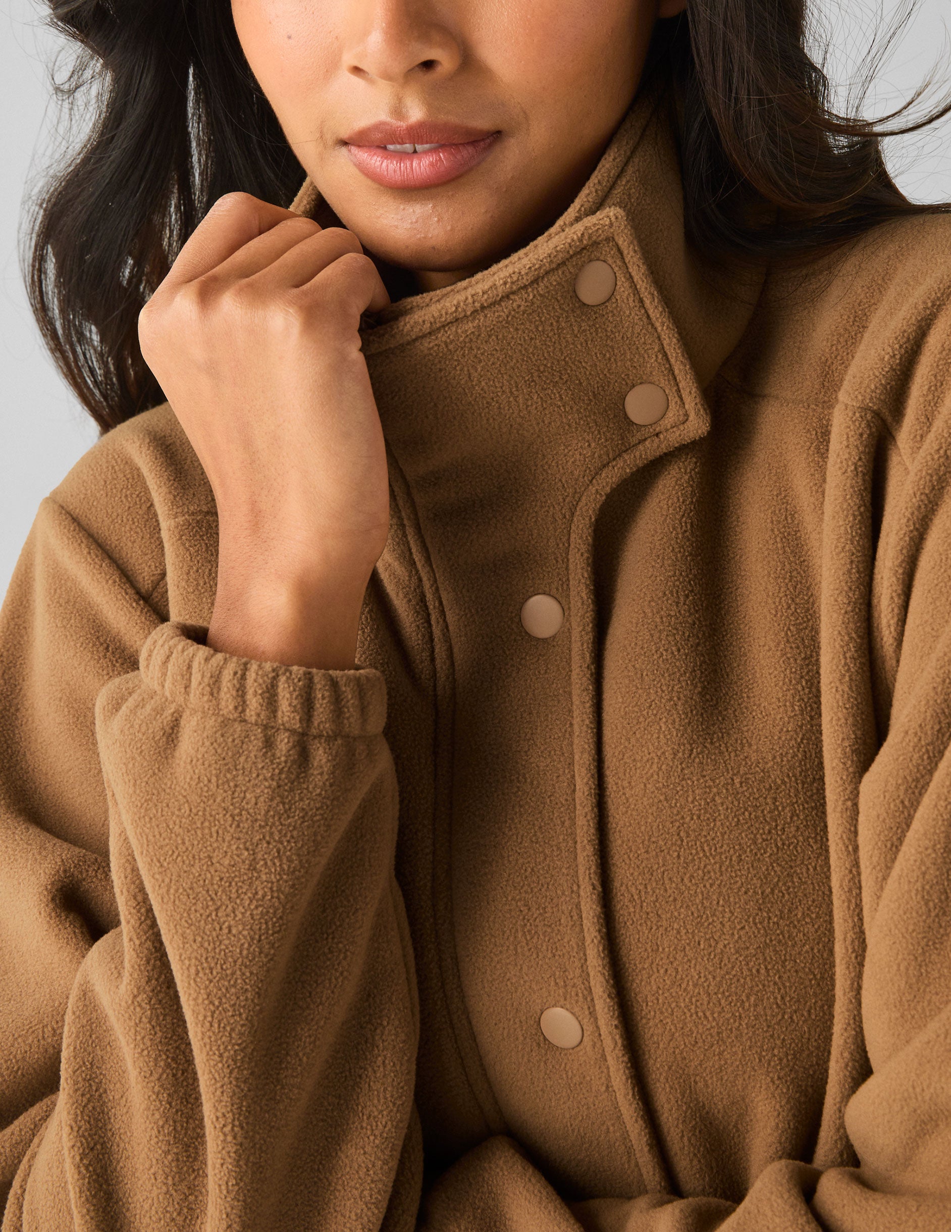 brown fleece button down jacket.