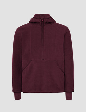 red fleece quarter zip jacket with a kangaroo pocket. 