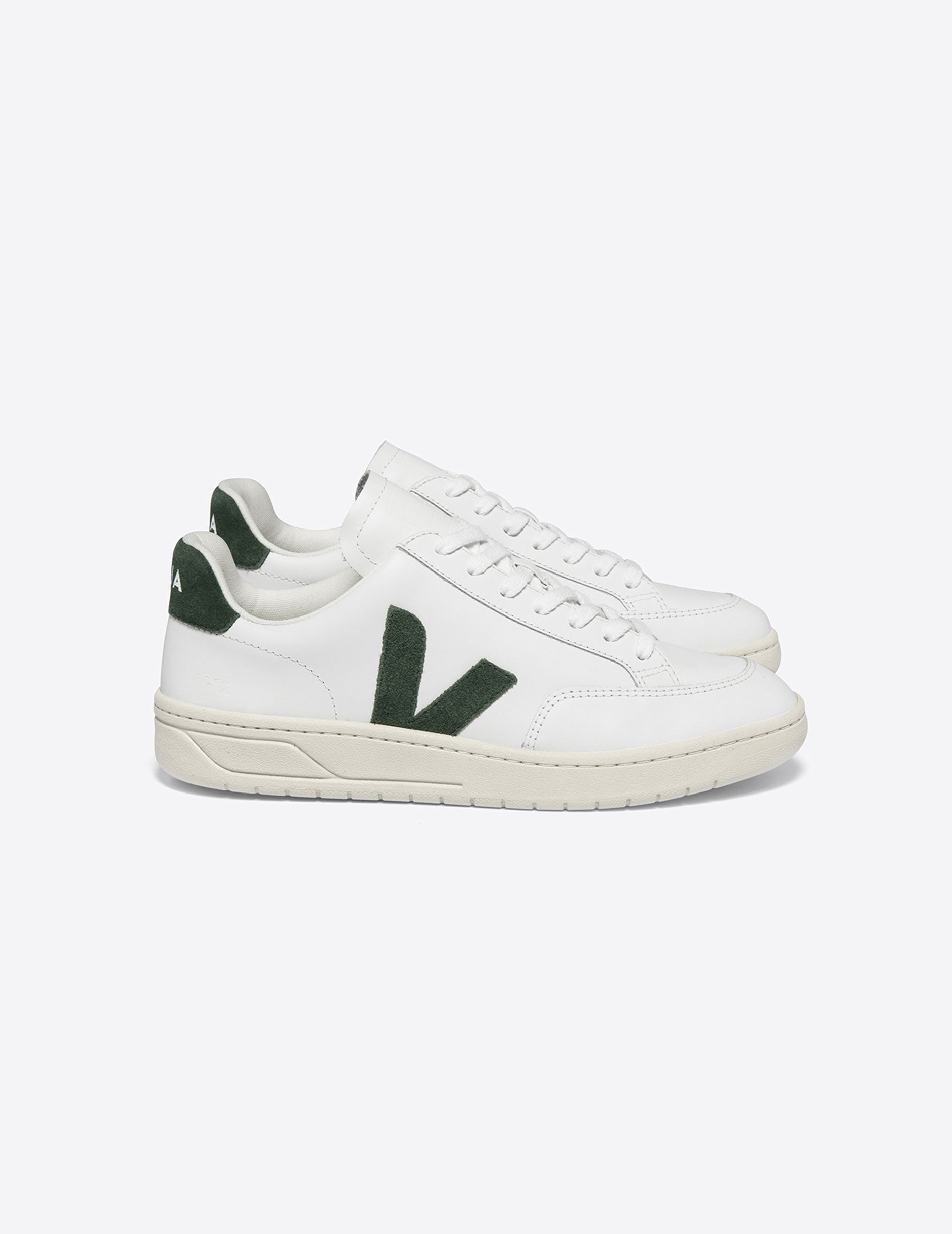 white and green veja sneaker