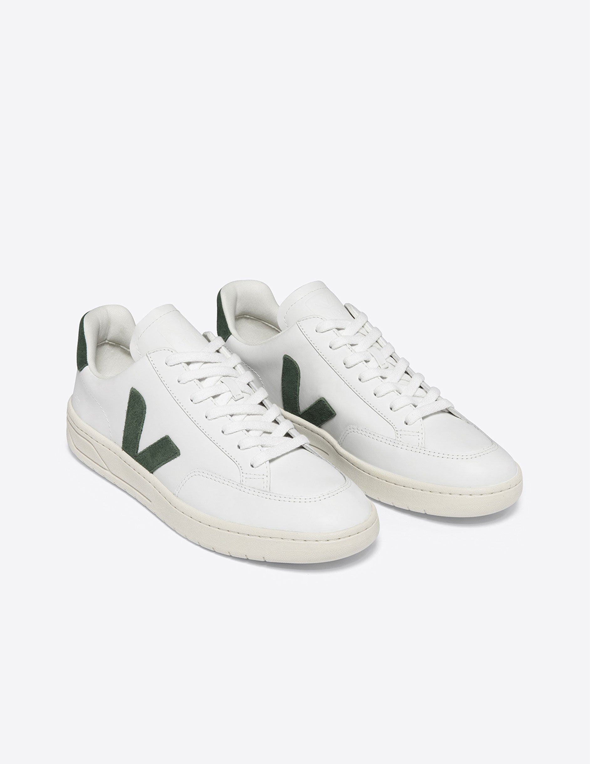 white and green veja sneaker