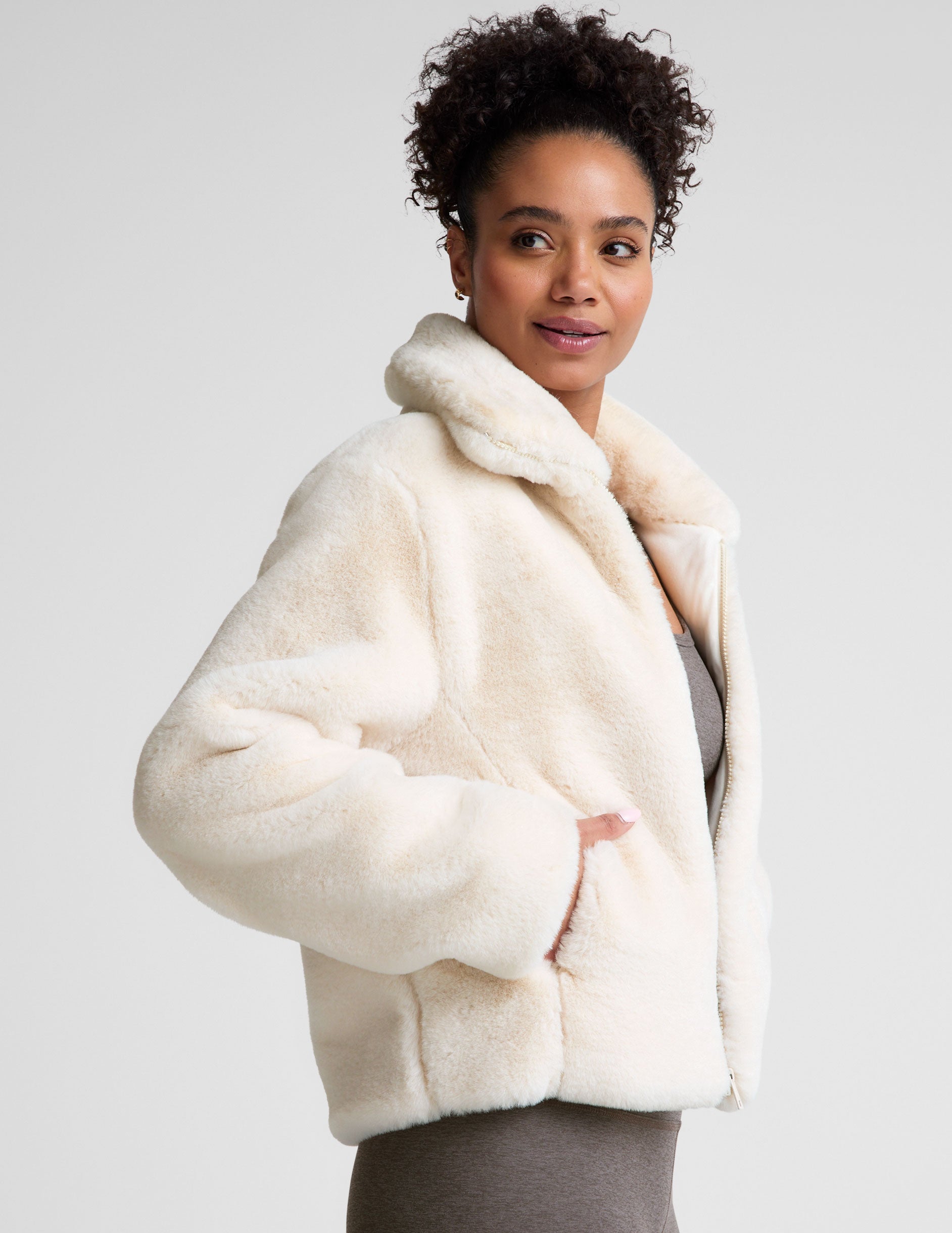 white faux fur zip-up collared jacket. 