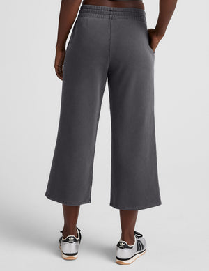 black relaxed fit cropped wide leg pants. 