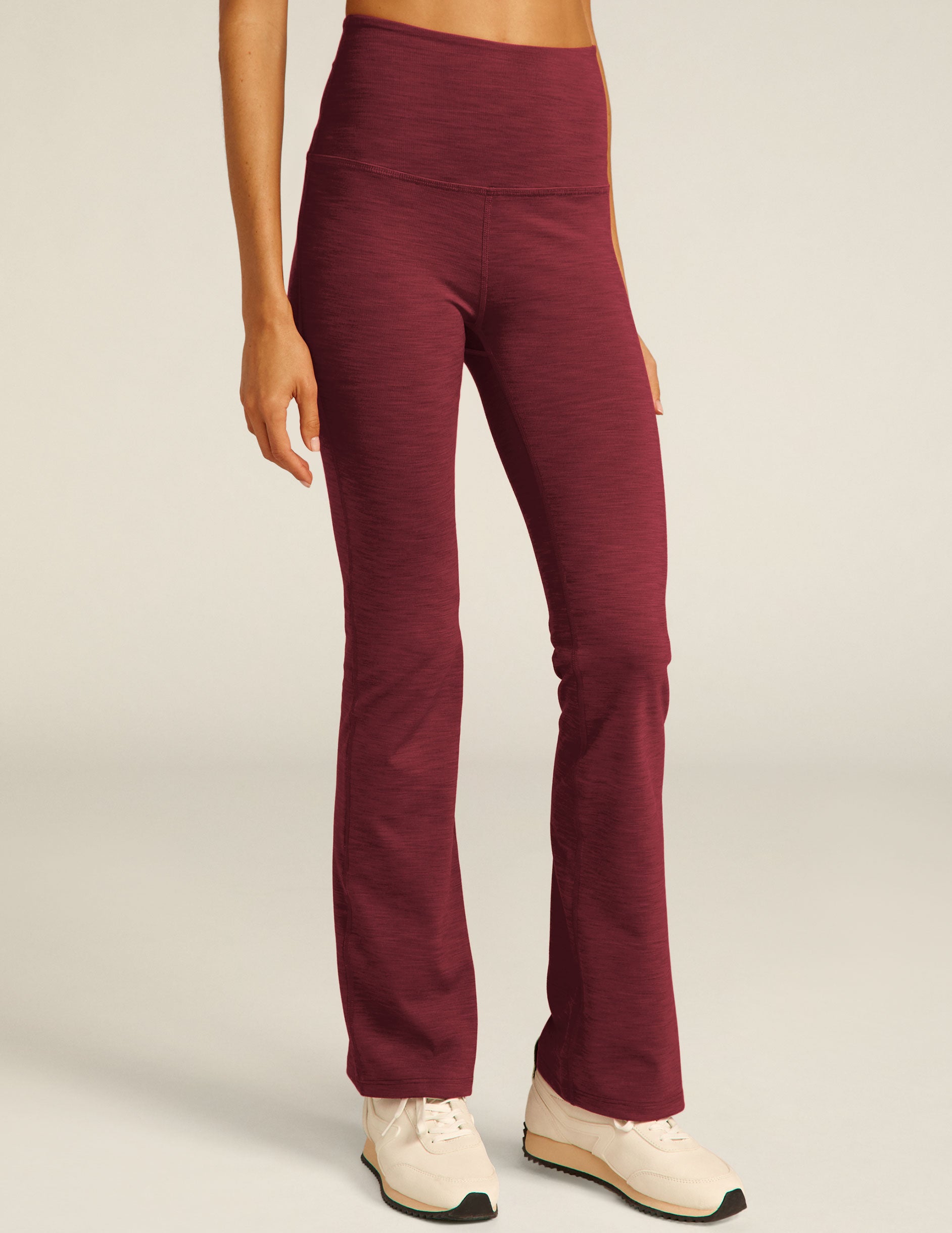 red high-waisted bootcut pants. 
