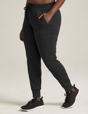 Slim fit Heather Rib Street Jogger in black heather with drawstring waist, side zipper pocket, and banded ankle cuffs.