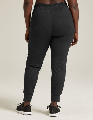 Back view of black Heather Rib Street Jogger showing the slim fit, high gathered waistband, and banded ankle cuffs.