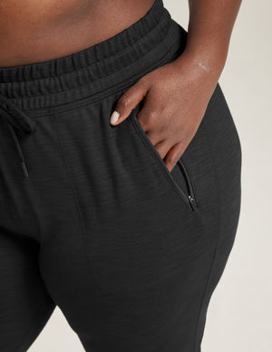 Heather Rib Street Jogger in black heather, featuring a ribbed texture, drawstring waist, and hand in zippered side pocket.