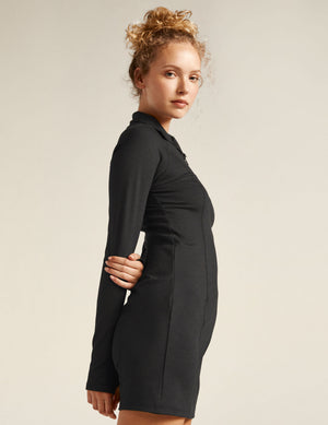 black midi dress with quarter-zup neckline. 
