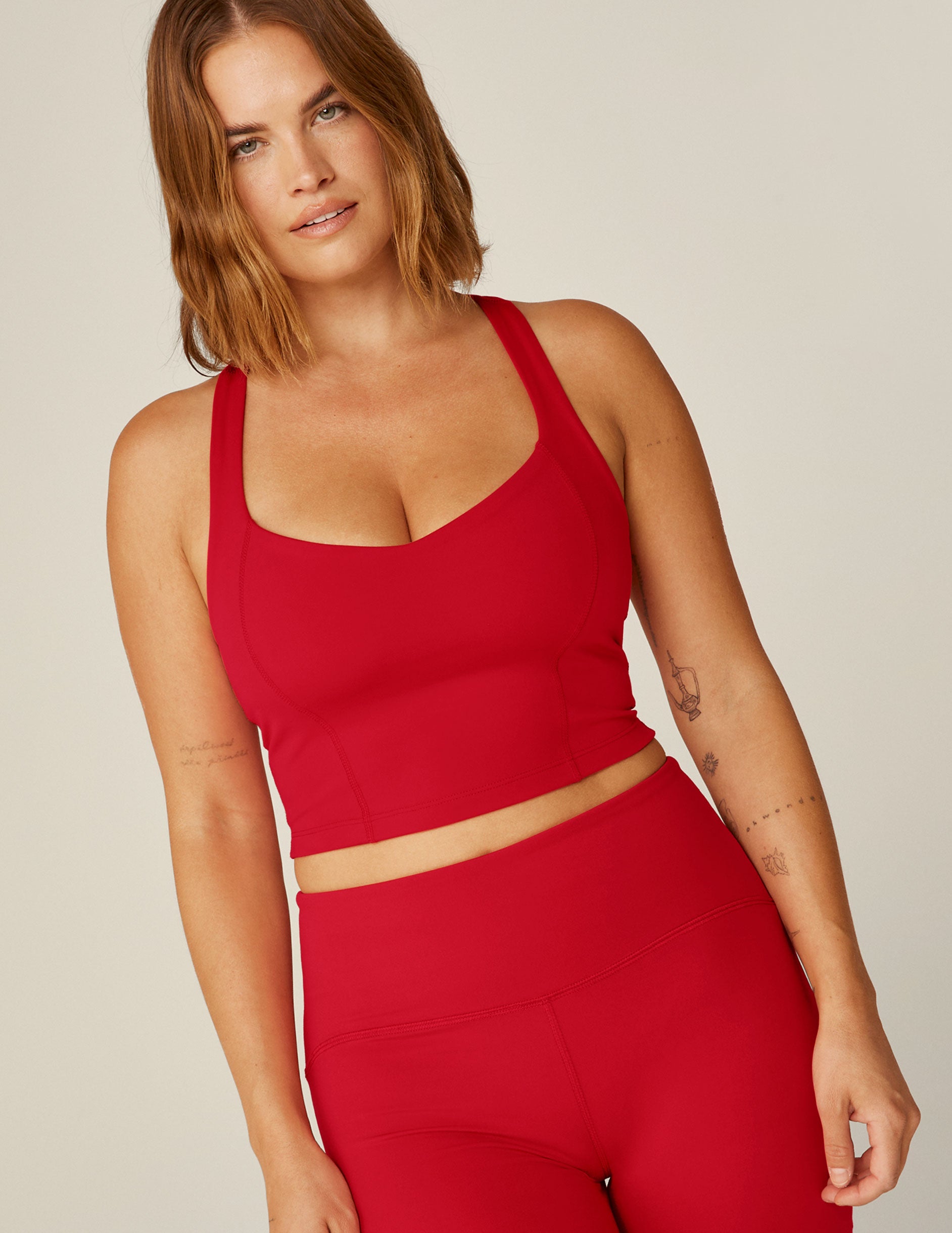 red v-neck powerbeyond cropped tank top. 