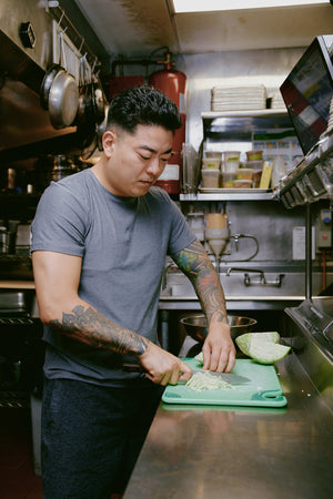 Jae chopping cabbage
