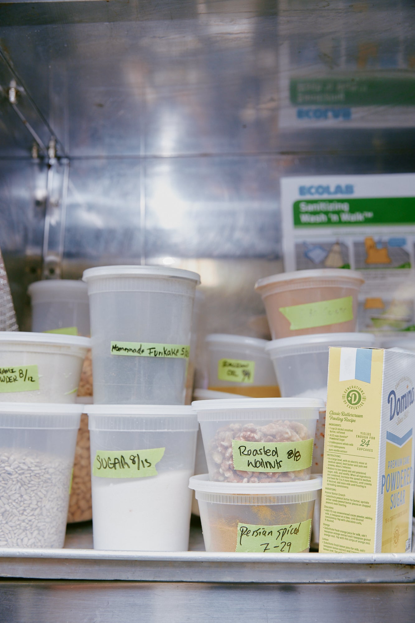 Labeled containers in kitchen