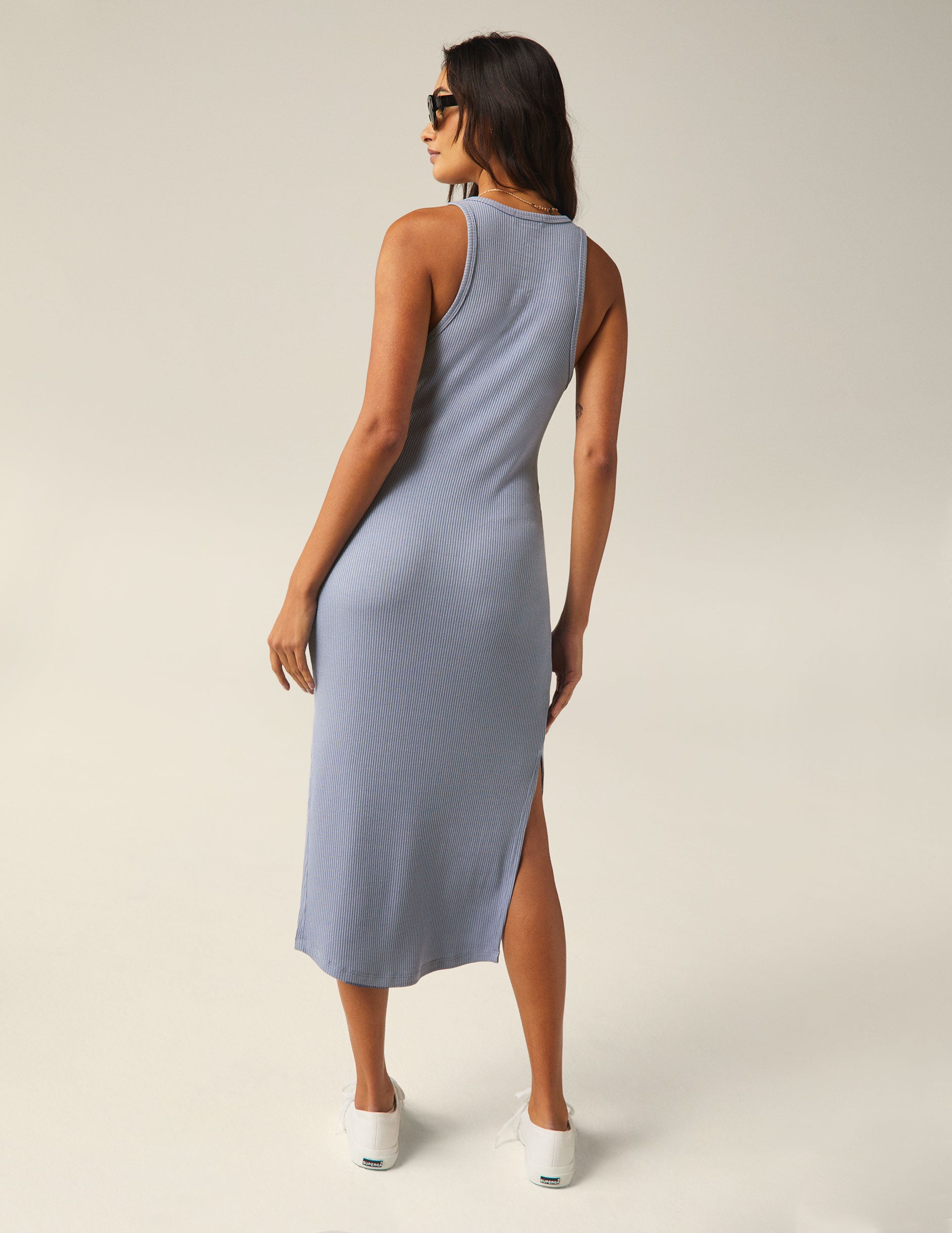 blue midi high-neck tank dress with a front side slit.