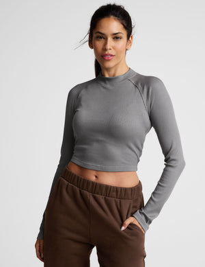 gray ribbed mock-neck cropped long sleeve top. 