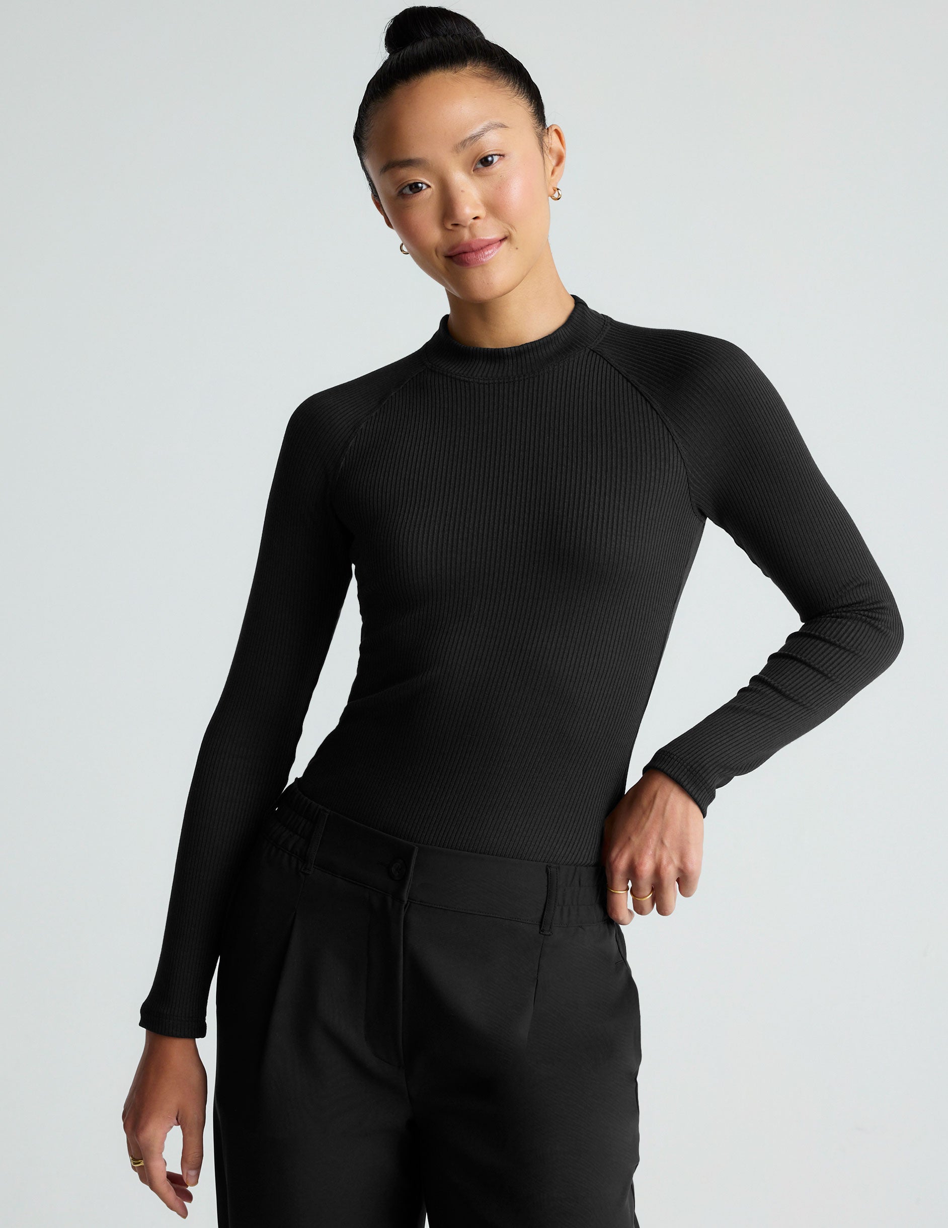 black long sleeve mock neck top.