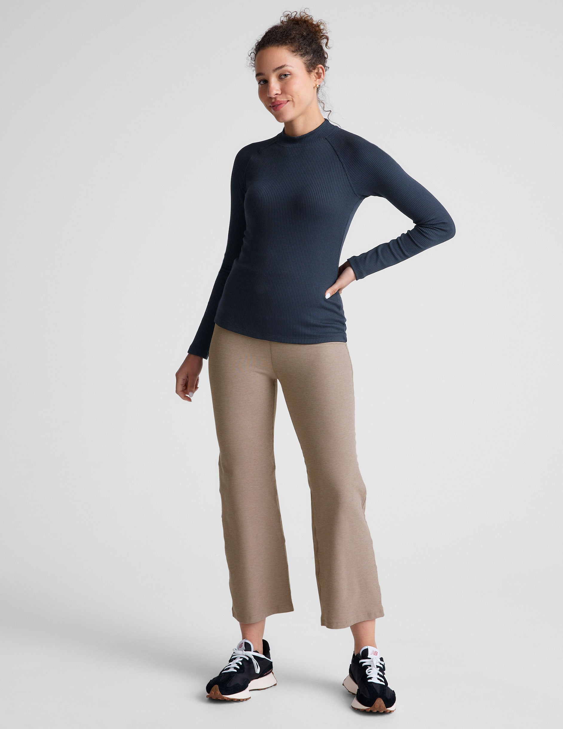 blue mock-neck long length ribbed long sleeve top. 