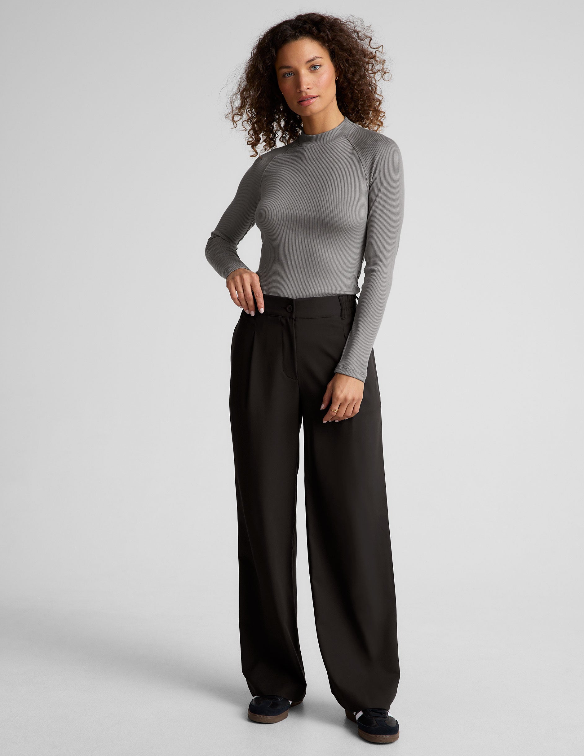 gray long length ribbed mock-neck long sleeve top. 