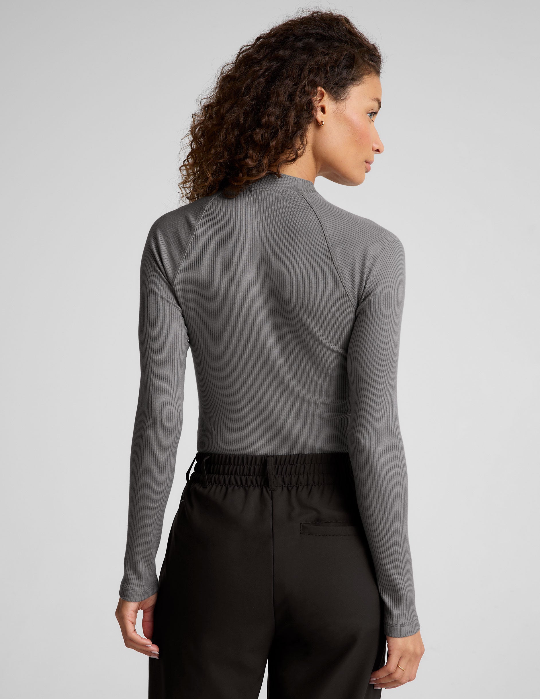 gray long length ribbed mock-neck long sleeve top. 