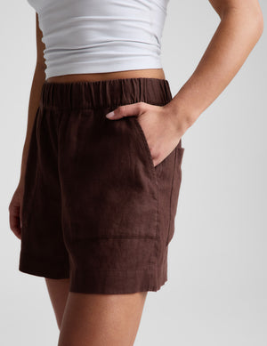 Side view of the brown SoftWash Linen Easy Short showing its mid-rise elastic waistband and front slant pockets.