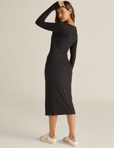 black midi dress with a twist design and front side slit. 