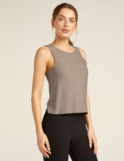 brown tank top with an open back detail. 