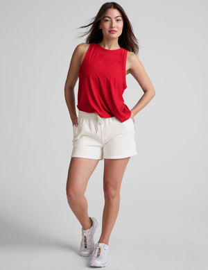 red loose-fitting tank top with a crew neckline. 