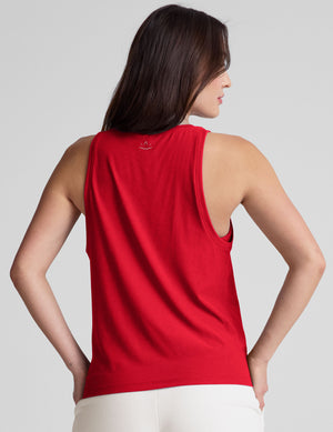 red loose-fitting tank top with a crew neckline. 
