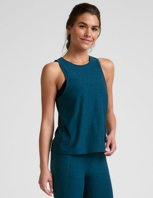 blue relaxed fit tank top with a high scoop neckline. 