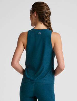 blue relaxed fit tank top with a high scoop neckline. 