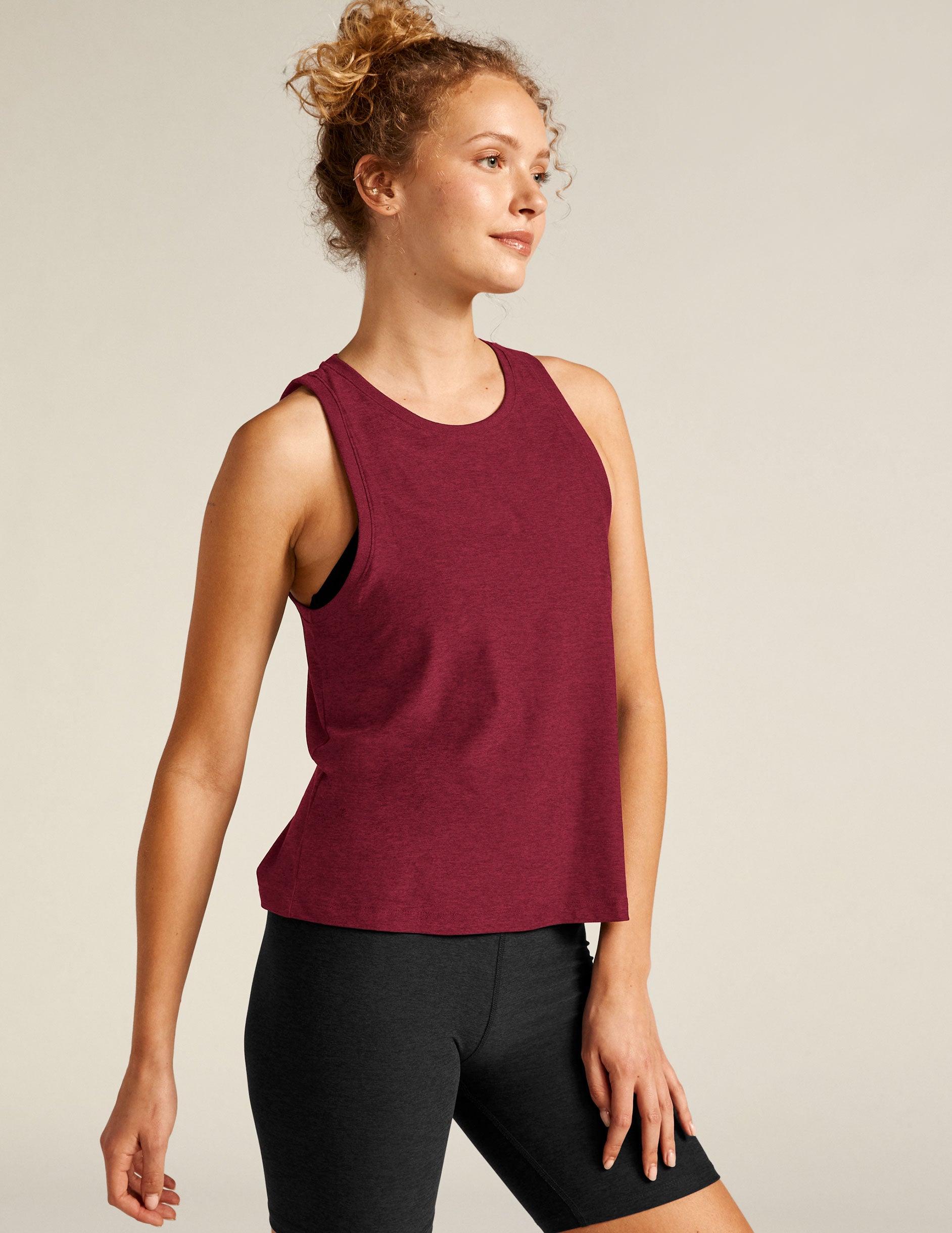 red high front neckline tank top with a relaxed fit. 