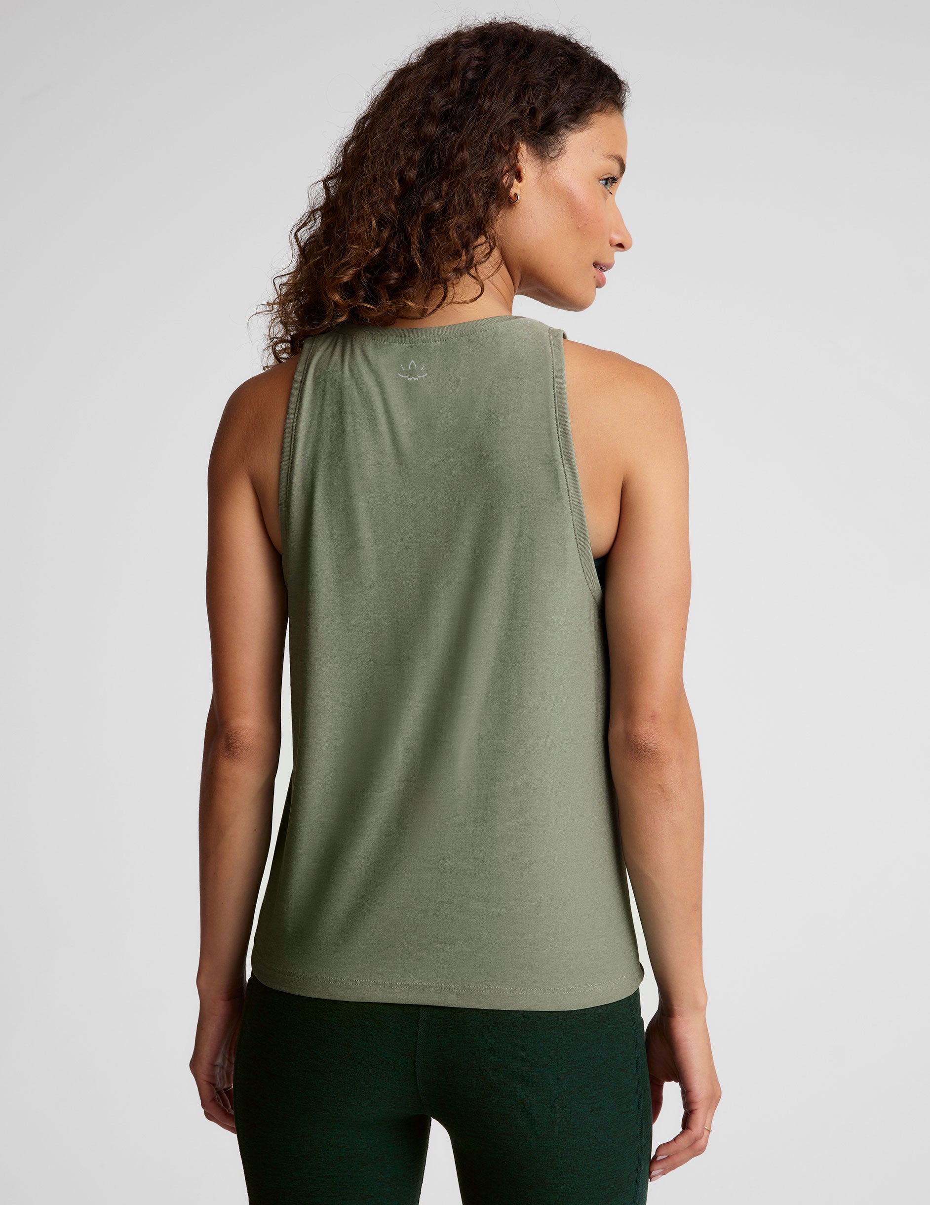 green relaxed fit tank with a hight front neckline. 