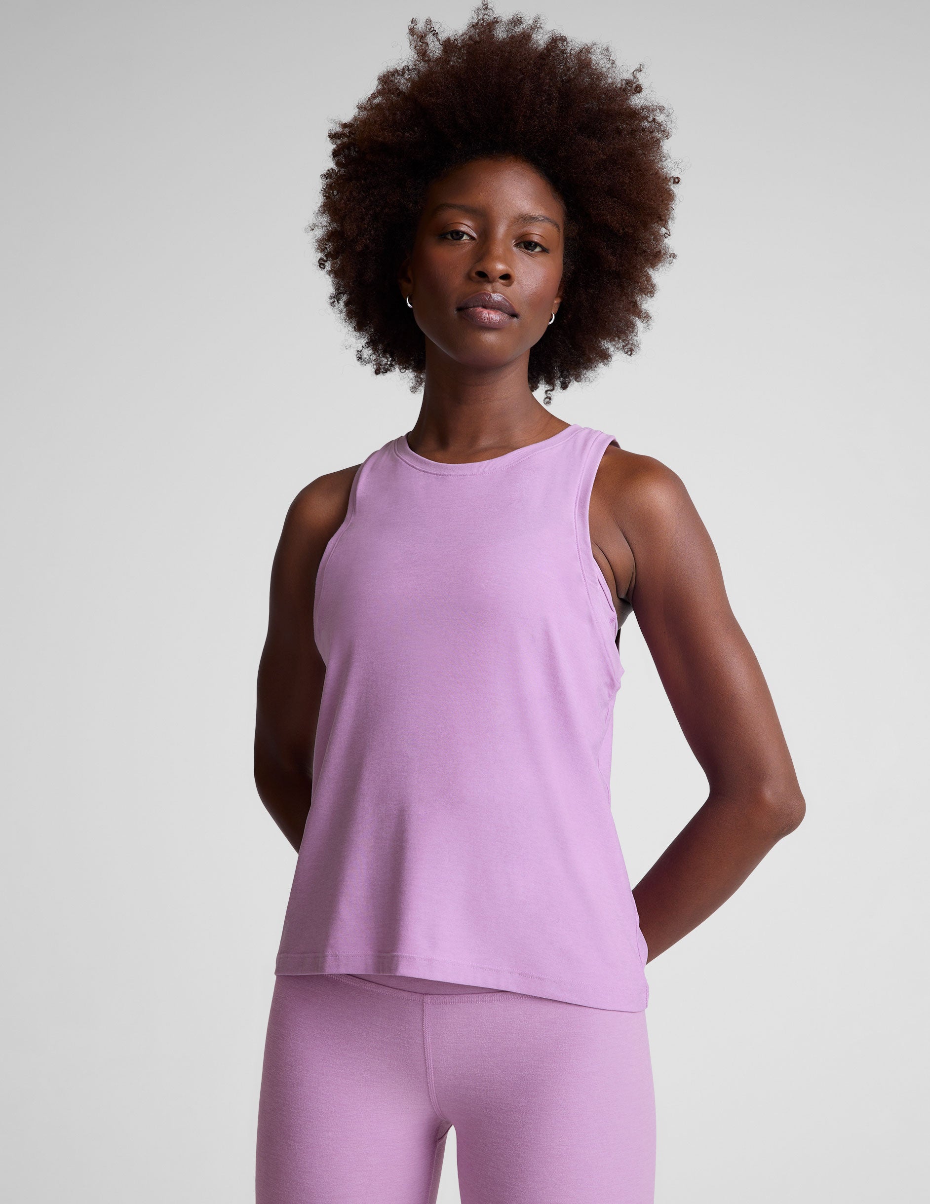 purple relaxed fit tank top with a high front neckline. 