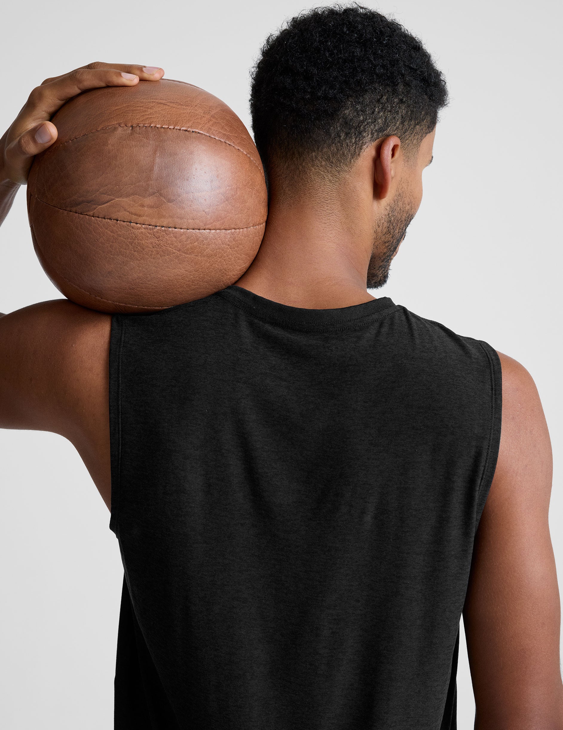 mens black muscle tank top with a rib crew neckline.