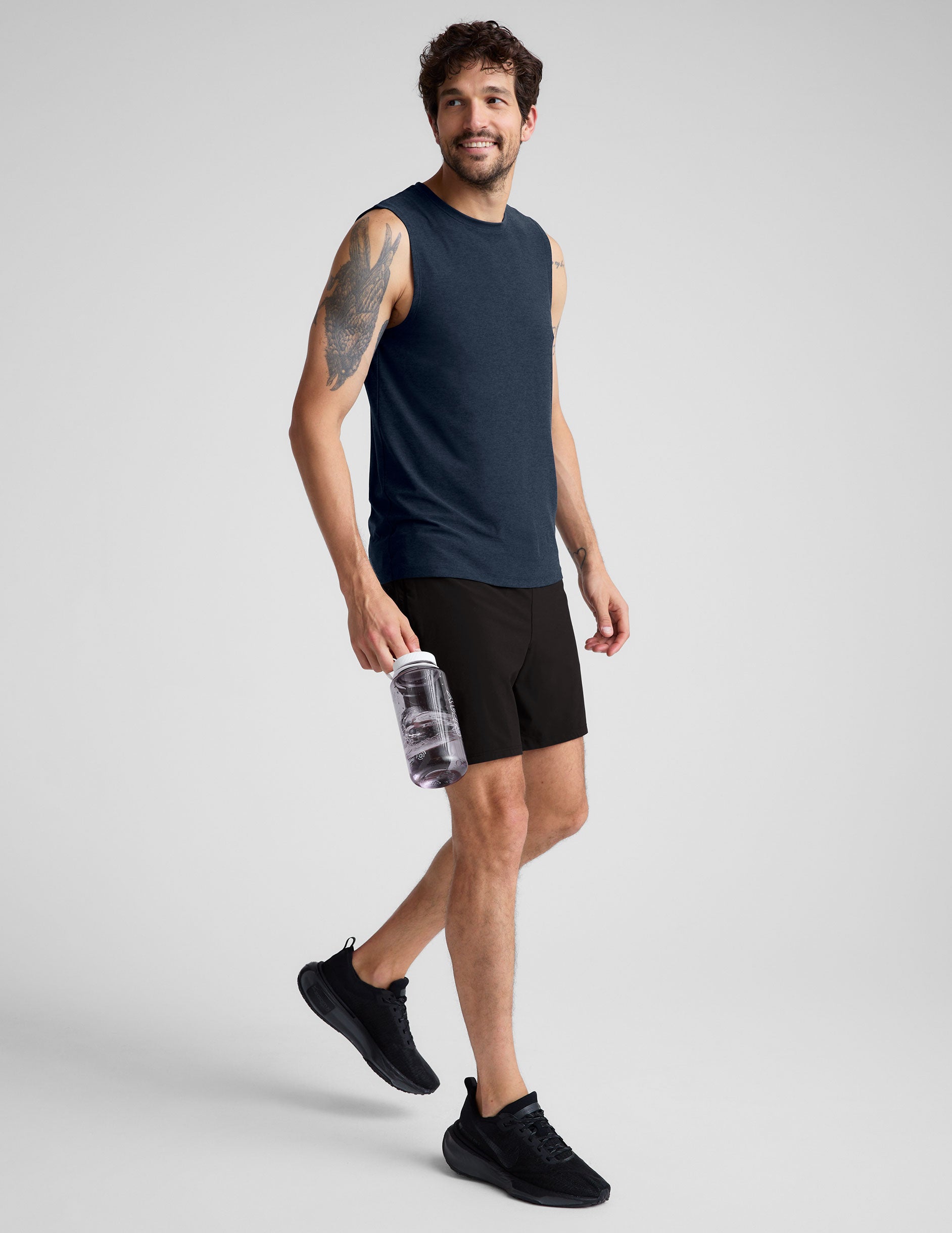 blue sleeveless mens muscle tank top with a ribbed collar.