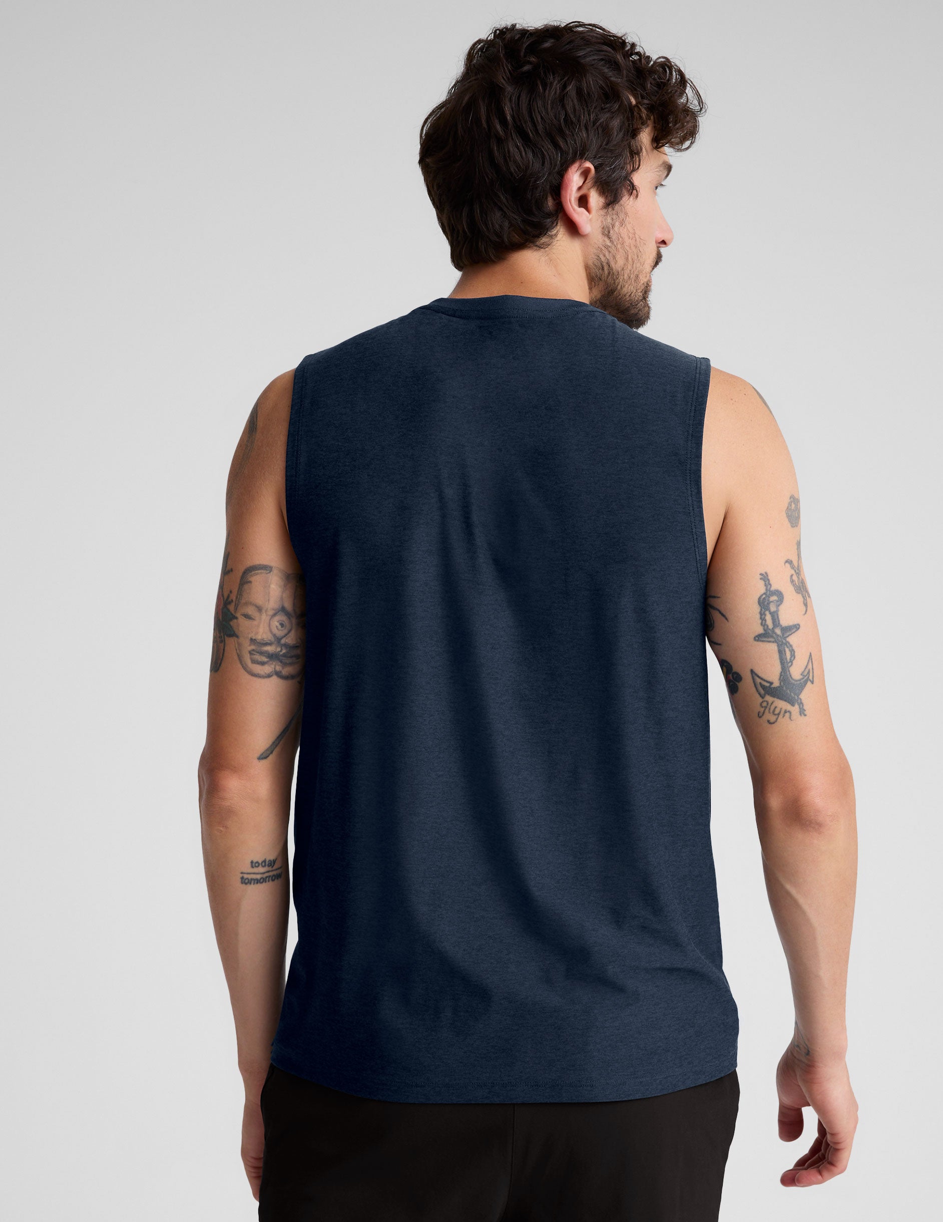 blue sleeveless mens muscle tank top with a ribbed collar.